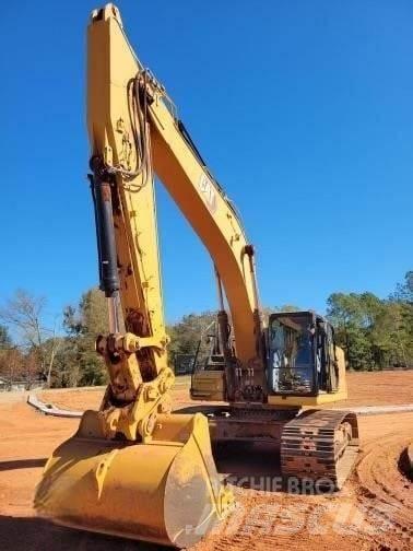 CAT 340 Pásová rýpadla