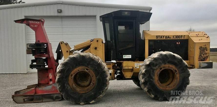 CAT 573C Kácecí harvestory