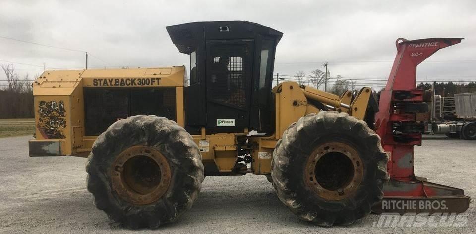 CAT 573C Kácecí harvestory