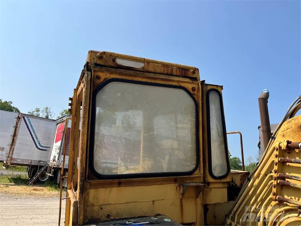 CAT 613C Skrejpry