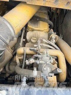 CAT 621G Skrejpry