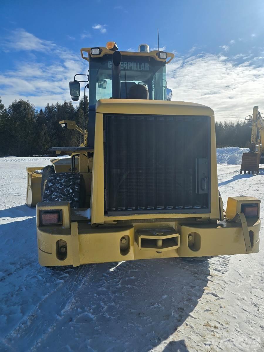 CAT 938H Kolové nakladače