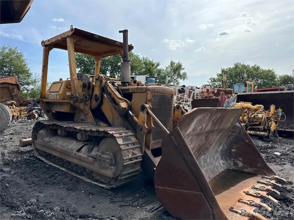 CAT 977 Pásové nakladače