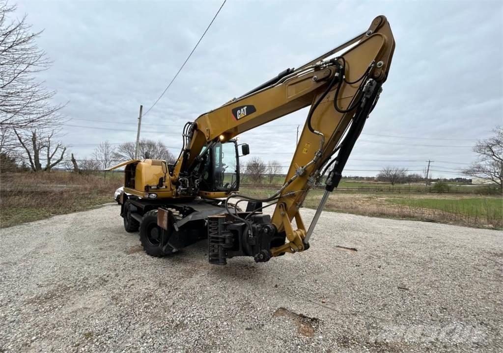 CAT M313D Kolová rýpadla