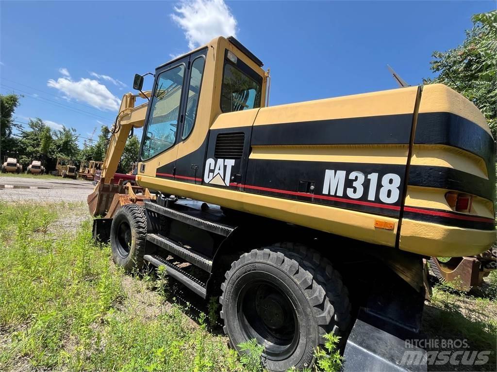 CAT M318 Kolová rýpadla