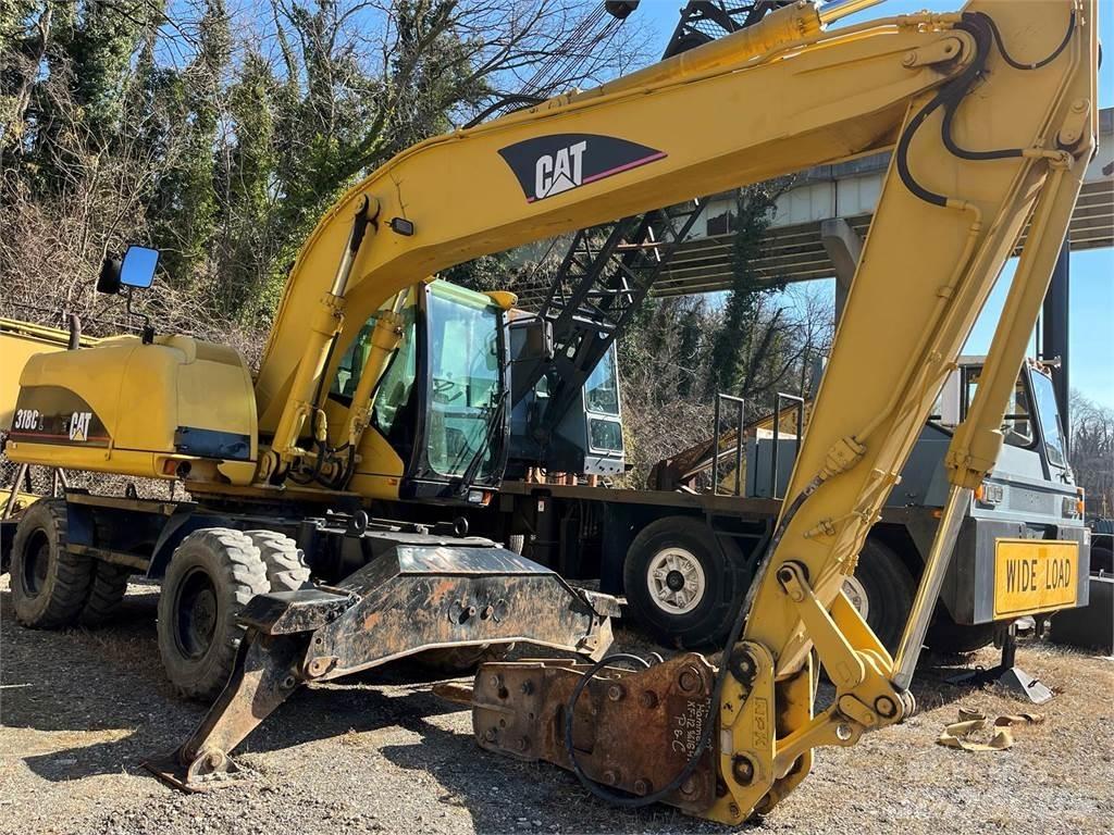 CAT M318C Kolová rýpadla