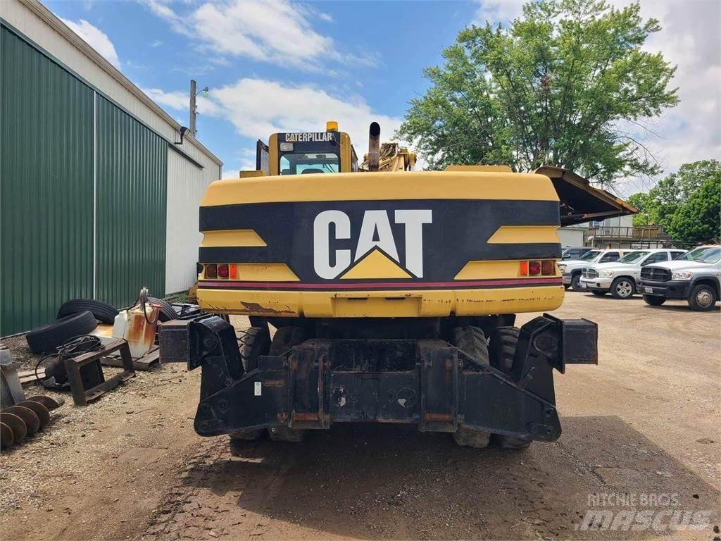 CAT M320 Kolová rýpadla