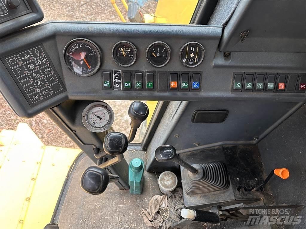 New Holland TC56 Sklízecí mlátičky