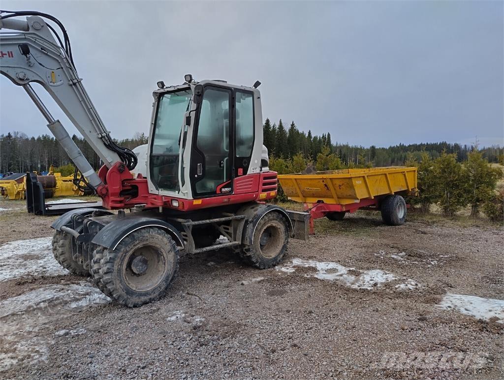 Takeuchi TB295W Kolová rýpadla