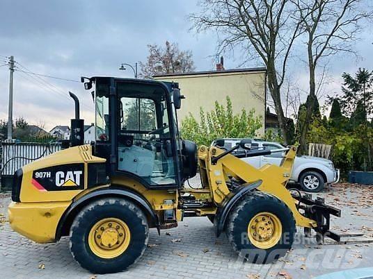 CAT 907H Kolové nakladače