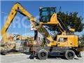 CAT MH3024 Stroje pro manipulaci s odpadem