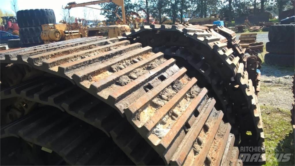 CAT 231D Pásy, řetězy a podvozek