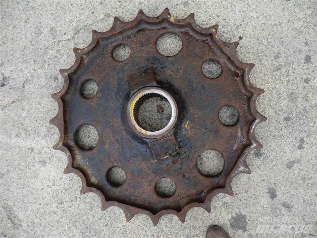CAT 231D Pásy, řetězy a podvozek