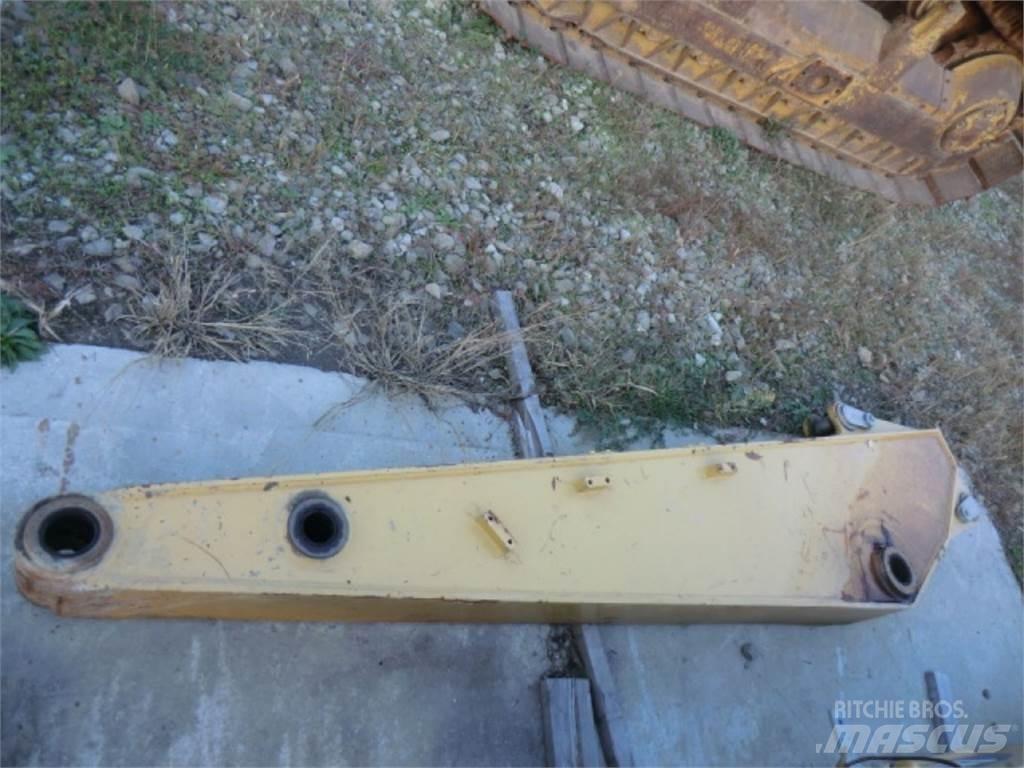 CAT 312D Podvozky a zavěšení kol