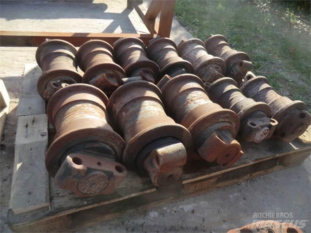 CAT 330 Pásy, řetězy a podvozek