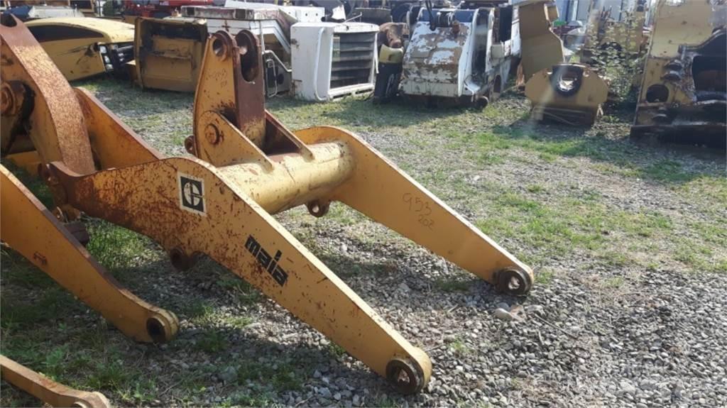 CAT 953 Podvozky a zavěšení kol
