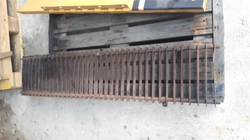 CAT 988H Podvozky a zavěšení kol