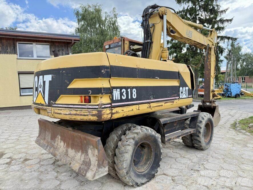CAT M318 Kolová rýpadla