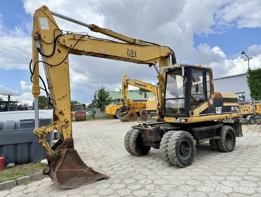 CAT M318 Kolová rýpadla
