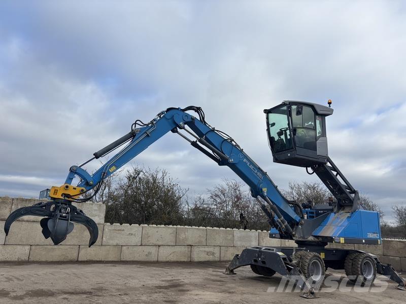 Fuchs MHL320 Stroje pro manipulaci s odpadem