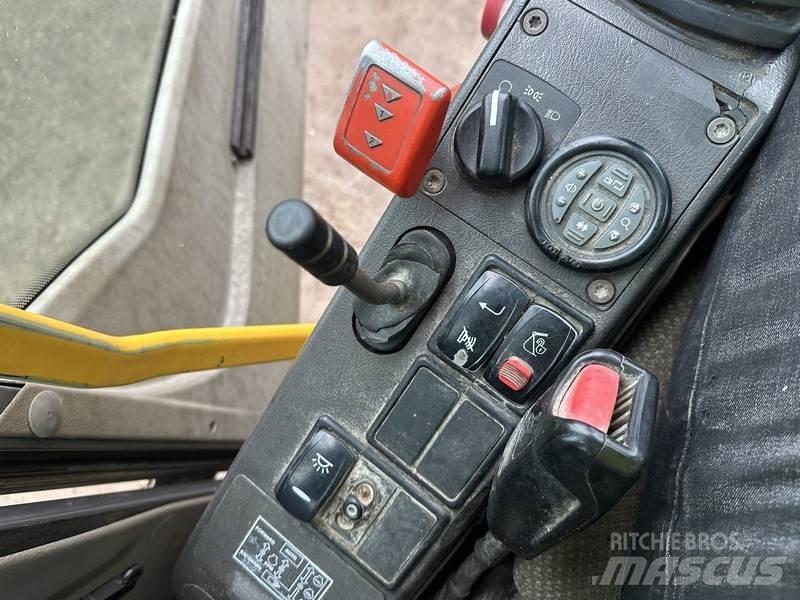Volvo EW140 Kolová rýpadla