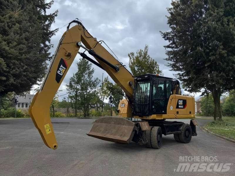 CAT MH3022 Stroje pro manipulaci s odpadem