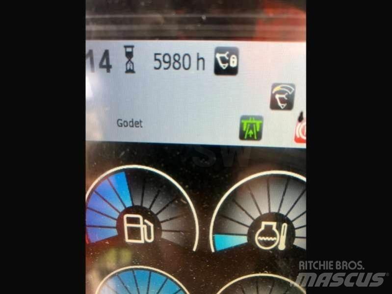 CAT MH3022 Stroje pro manipulaci s odpadem