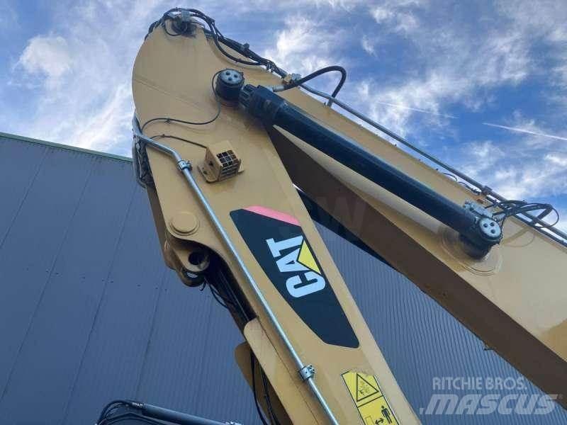 CAT MH3022 Stroje pro manipulaci s odpadem