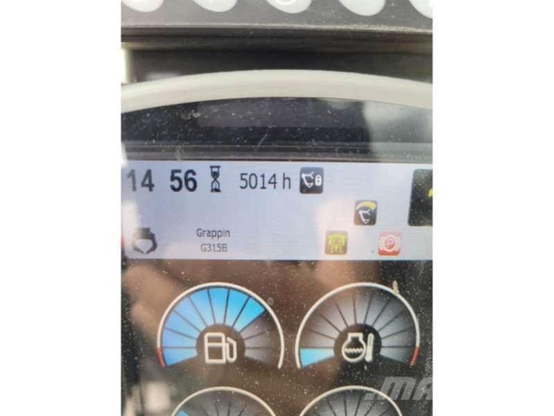CAT MH3022 Stroje pro manipulaci s odpadem