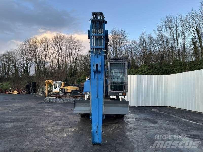Fuchs MHL320 Stroje pro manipulaci s odpadem