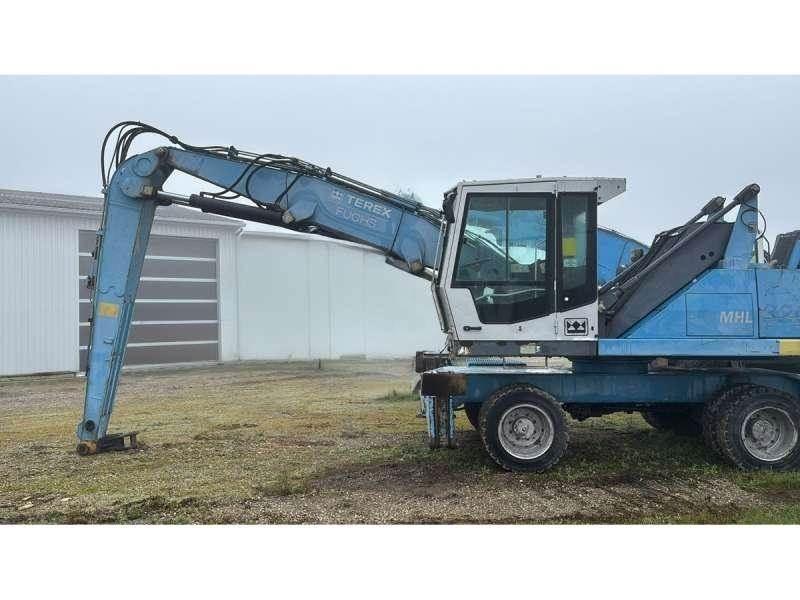 Fuchs MHL320 Stroje pro manipulaci s odpadem