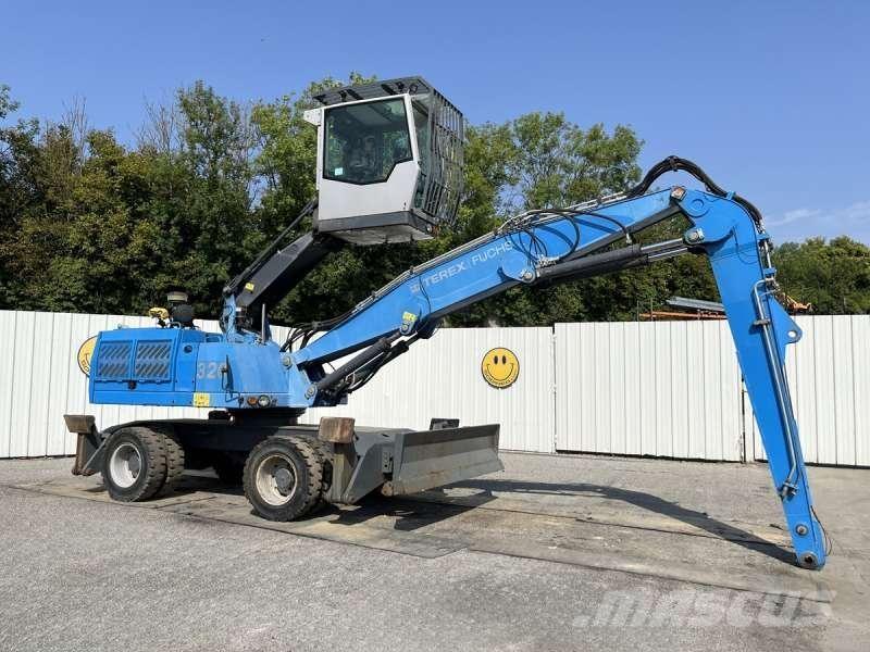 Fuchs MHL320 Stroje pro manipulaci s odpadem