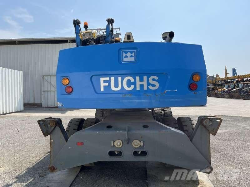 Fuchs MHL320 Stroje pro manipulaci s odpadem