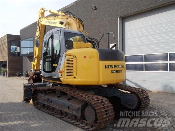New Holland E150 Pásová rýpadla
