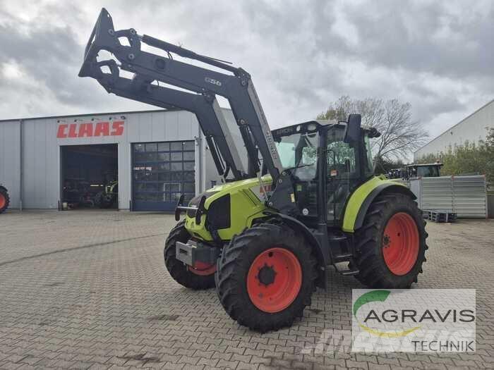 CLAAS ARION 410 CIS Traktory