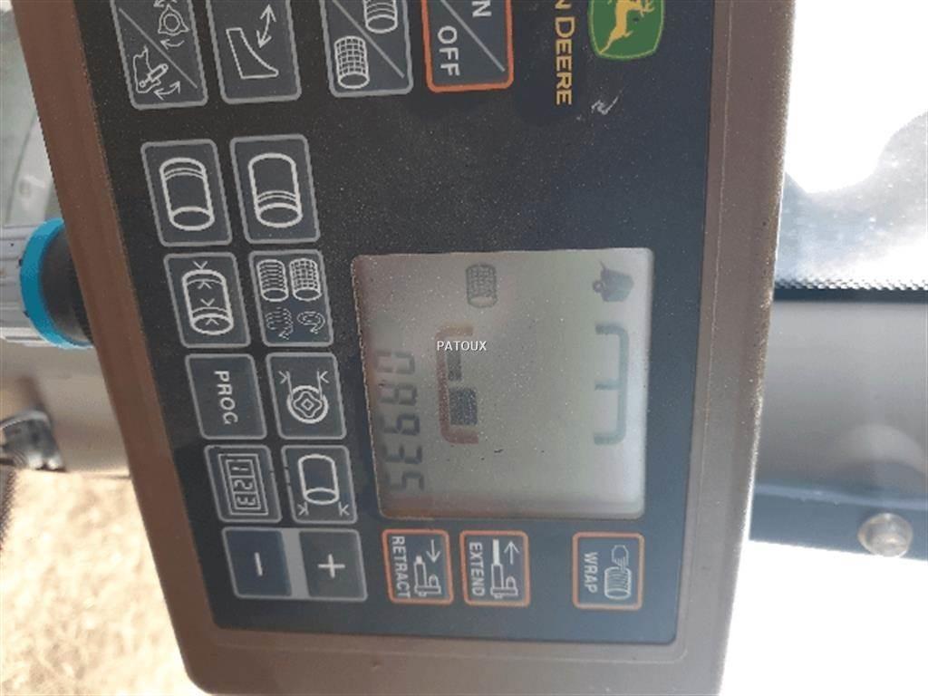 John Deere 864 Lis na válcové balíky