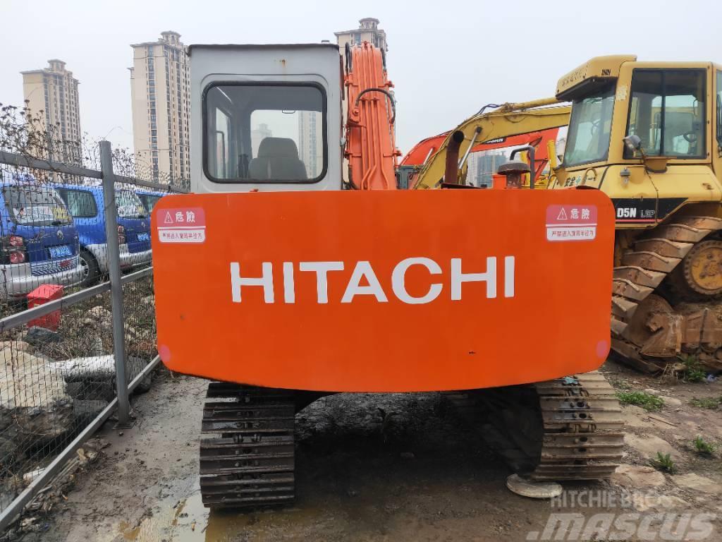 Hitachi EX 60 Pásová rýpadla