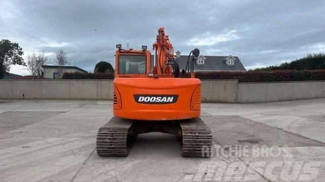 Doosan DX 140 Pásová rýpadla