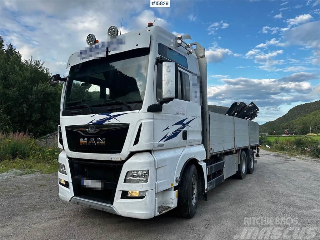 MAN TGX 26.560 Flatbed truck with Hiab 138 crane from  Valníky/Sklápěcí bočnice