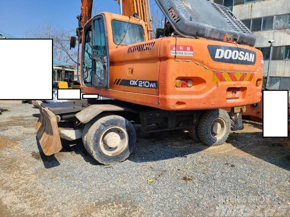 Doosan DX 210 W Kolová rýpadla