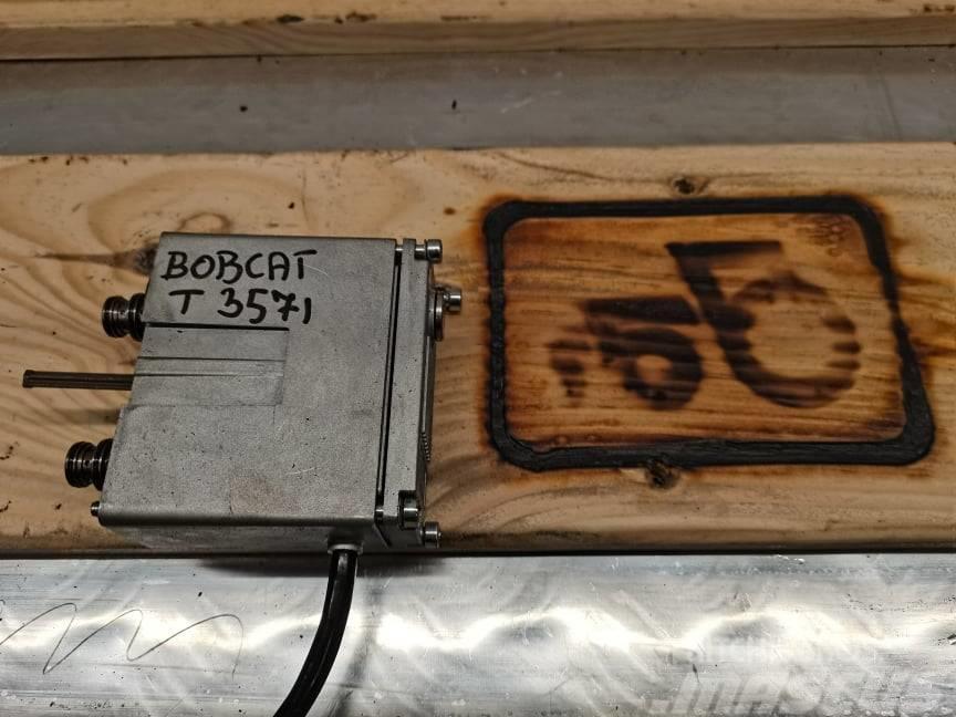 Bobcat T .... {new distributor coil } Motory